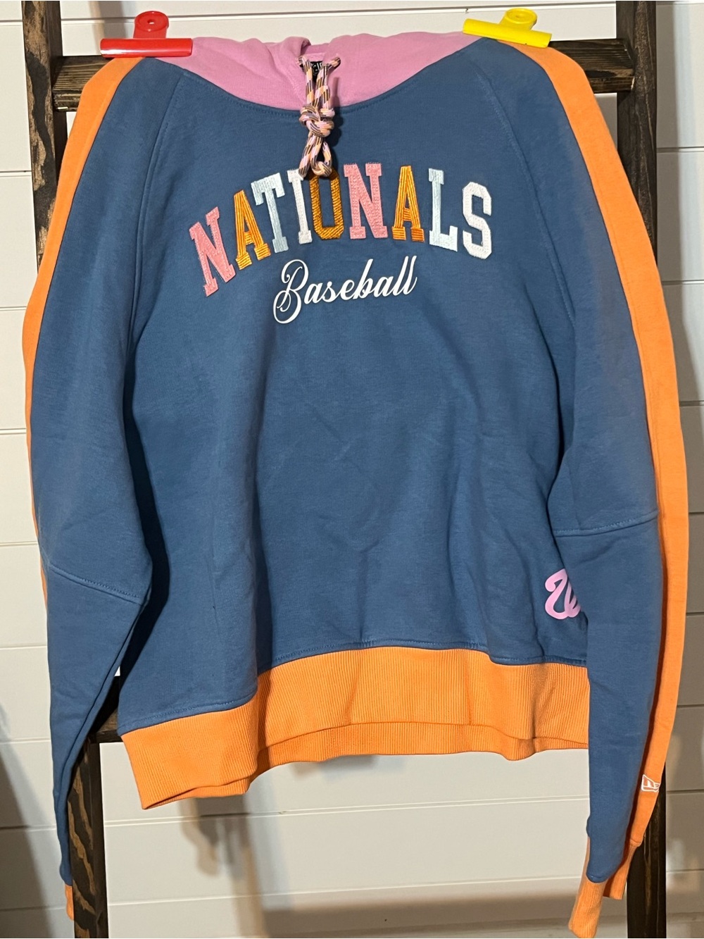 New Era Pink and Navy Colorblock Hoodie with Orange Lettering